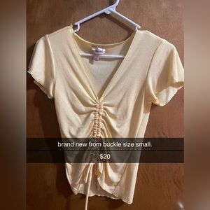 Women’s Buckle Top